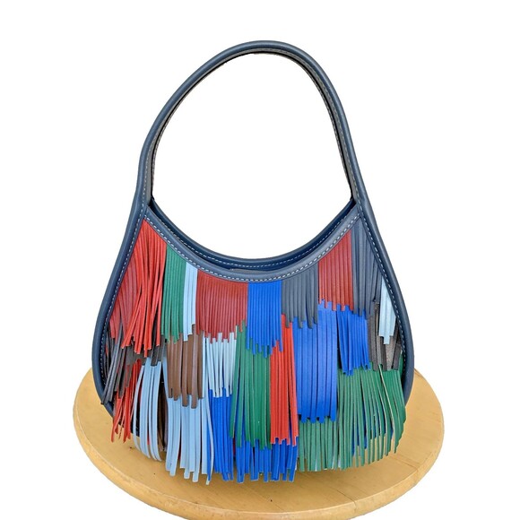 Coach Handbags - COACHTOPIA  Ergo Bag In Upcrafted Leather With Fringe CN960
